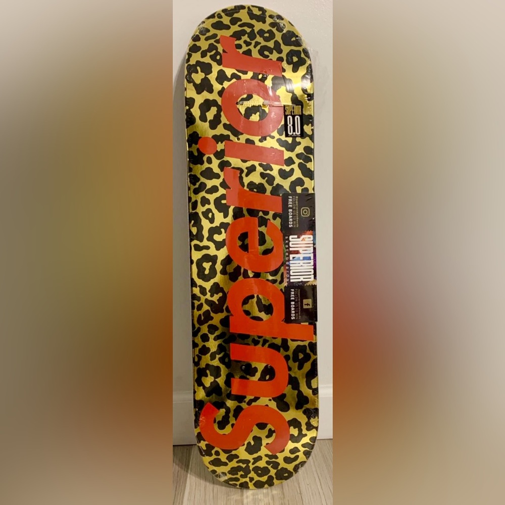 Leopard Print Skateboard Deck in Yellow with Red Logo